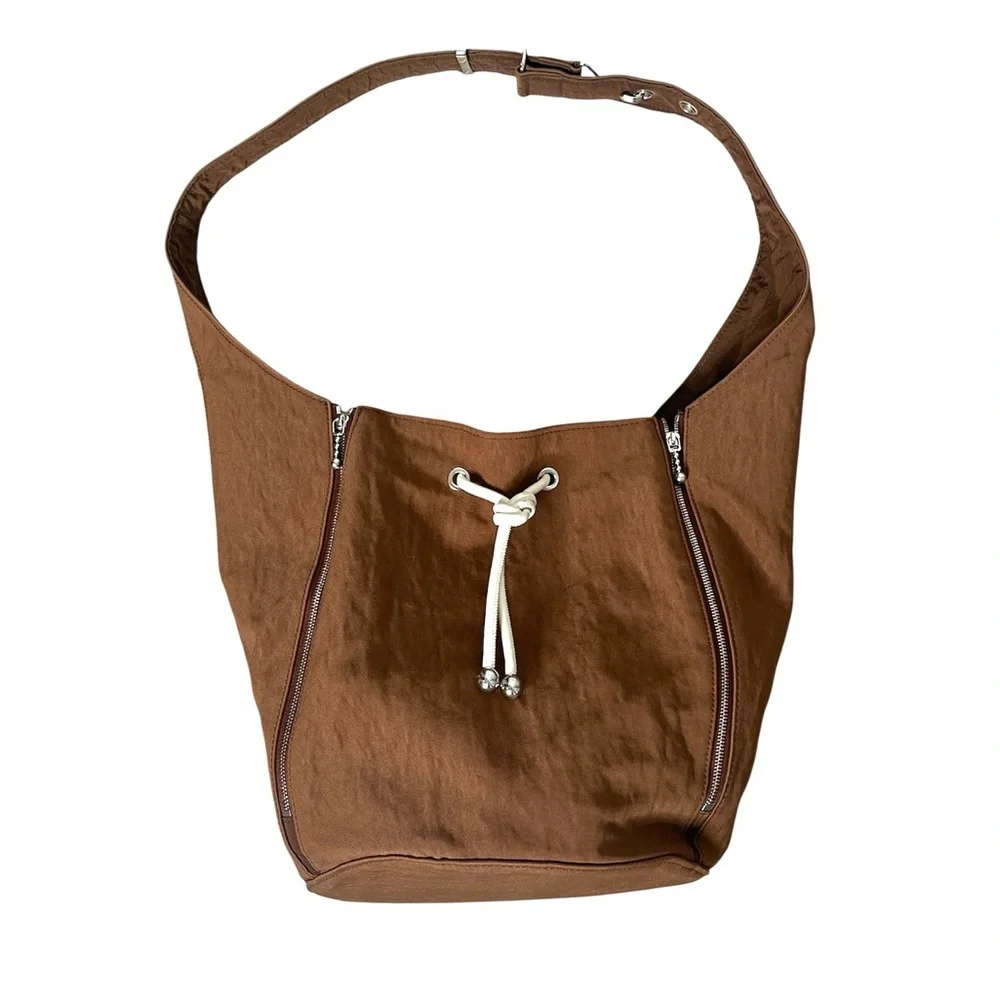 Tory Burch Women's Spaghetti Strap Zip Bucket Bag BOURBON VANILLA / French Cream
